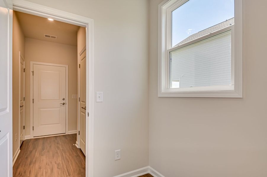 Spacious, unfurnished interior of a new home in The Beacon at Old Peachtree Single Family Homes, Lawrenceville (Image 385).