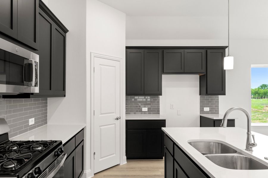 Furnished interior view inside a new home in Creekside, Royse City (Image 7).