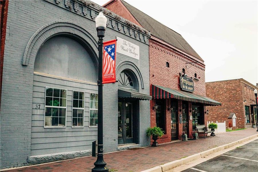 Front exterior of a new home in Rosewood Lake Estates, Hoschton, GA, highlighting curb appeal (Image 82).