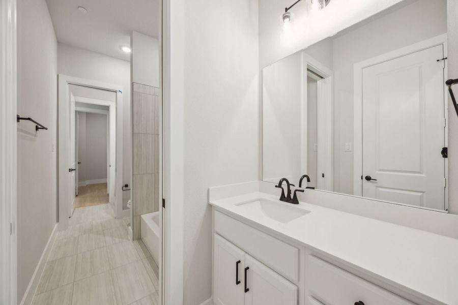 Furnished interior view inside a new home in Newman Village Townhomes, Frisco (Image 11).