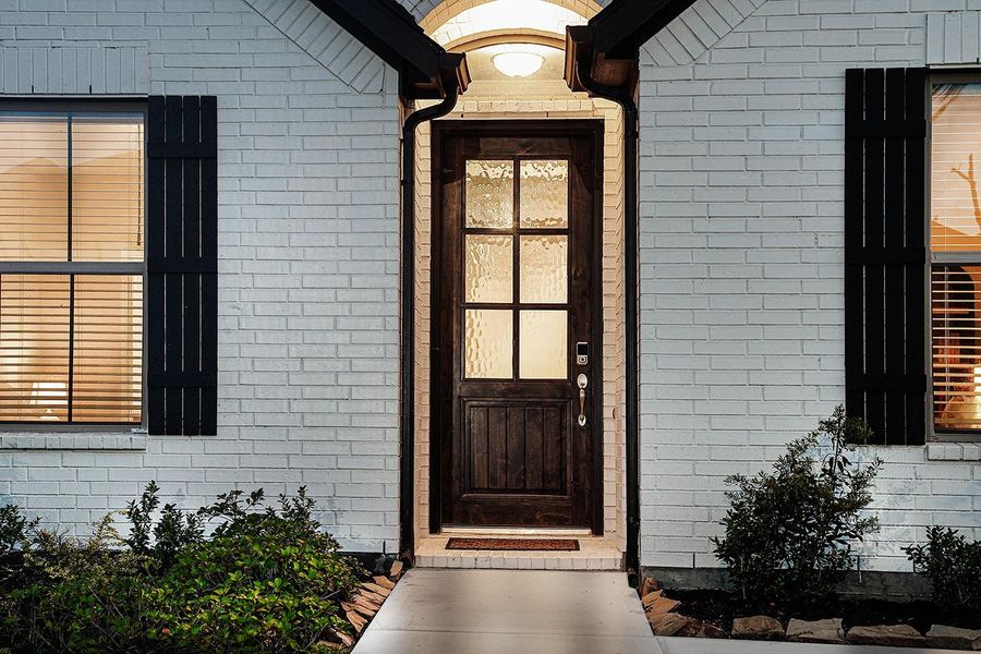 Exterior details and patio area of a home in The Meadows at Imperial Oaks, Conroe (Image 20).