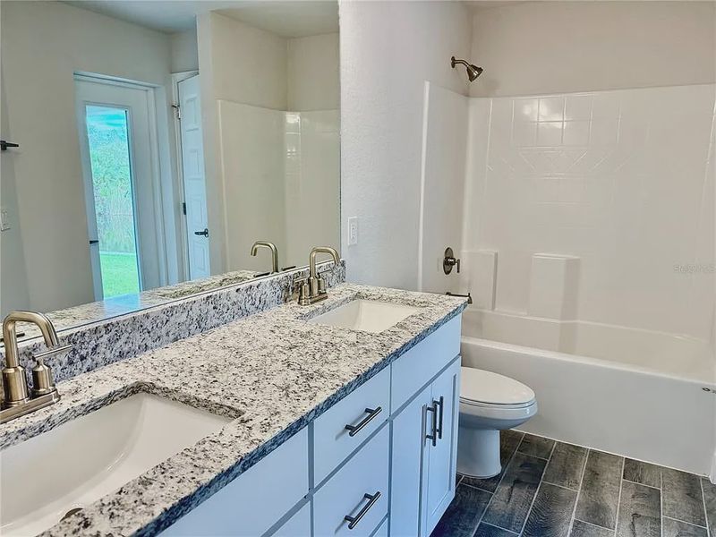 Furnished interior view inside a new home in South Gulf Cove, Port Charlotte (Image 8).