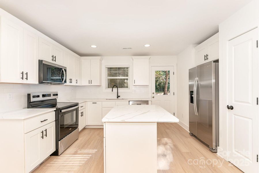 Furnished interior view inside a new home in , Statesville (Image 3).