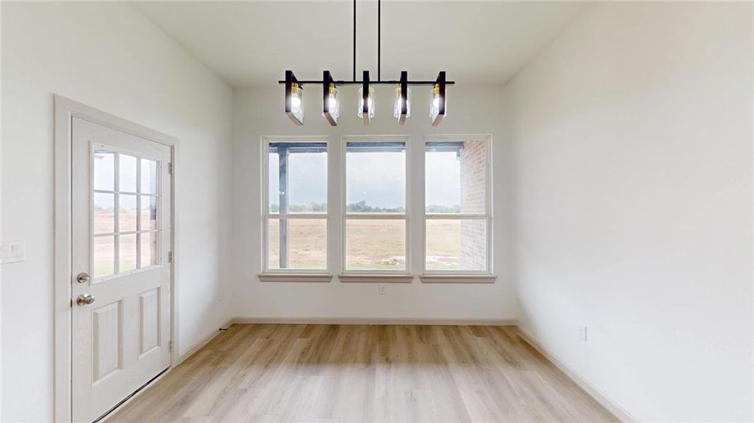 Spacious, unfurnished interior of a new home in , Point (Image 21).