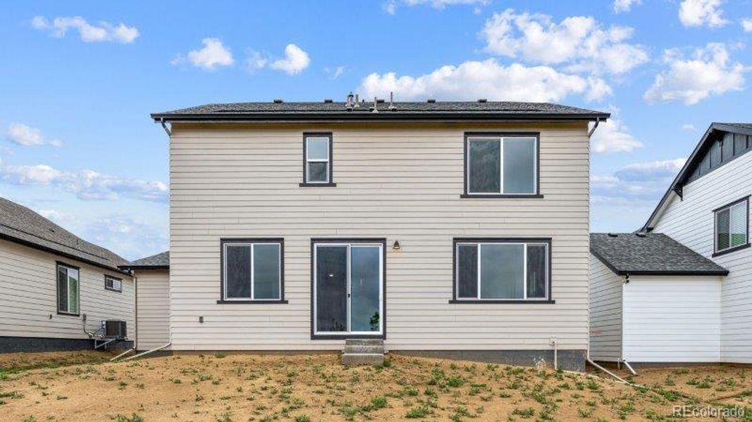 Exterior details and patio area of a home in Highlands Preserve, Mead (Image 2).