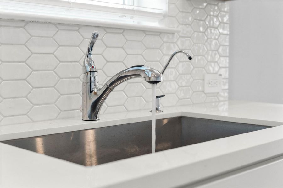 Integra Chrome faucet offers versatility and contemporary design, complemented by a convenient separate filtered water dispenser faucet. Integra Chrome faucet offers versatility and contemporary design, complemented by a convenient separate filtered water dispenser faucet.