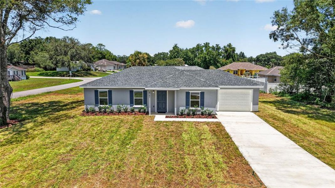 Front exterior of a new home in , Ocala, FL, highlighting curb appeal (Image 17). Front exterior of a new home in , Ocala, FL, highlighting curb appeal (Image 17).