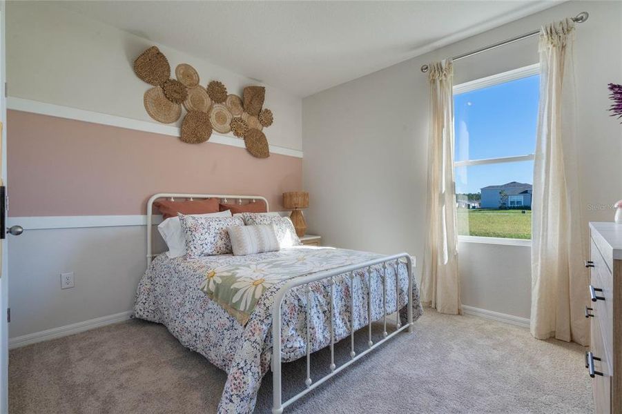 Furnished interior view inside a new home in Lake Deer Estates, Poinciana (Image 16).