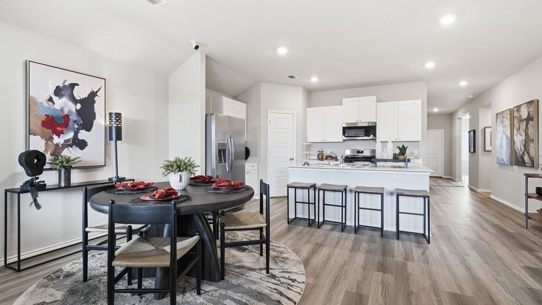 Representative furnished interior of a home built from the Plan by D.R. Horton in Bella Vista, Granbury (Image 9).
