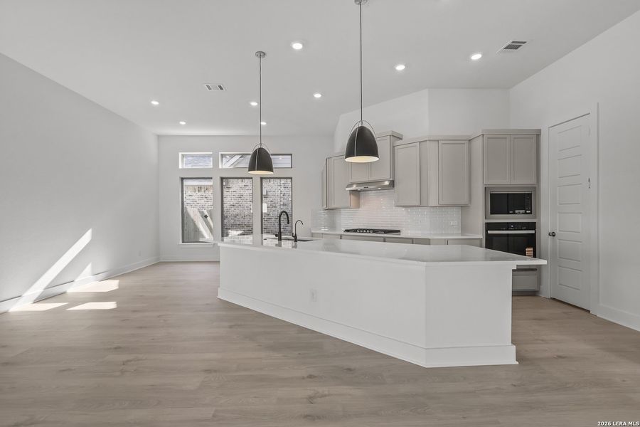 Furnished interior view inside a new home in Nopal Valley, San Antonio (Image 11).