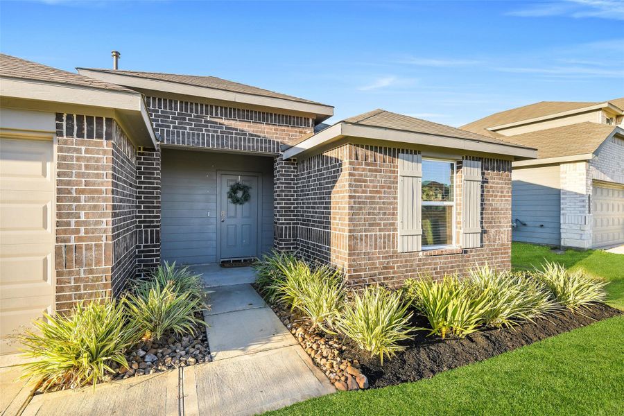 Exterior details and patio area of a home in Summerwood Trails, Willis (Image 22). Exterior details and patio area of a home in Summerwood Trails, Willis (Image 22).