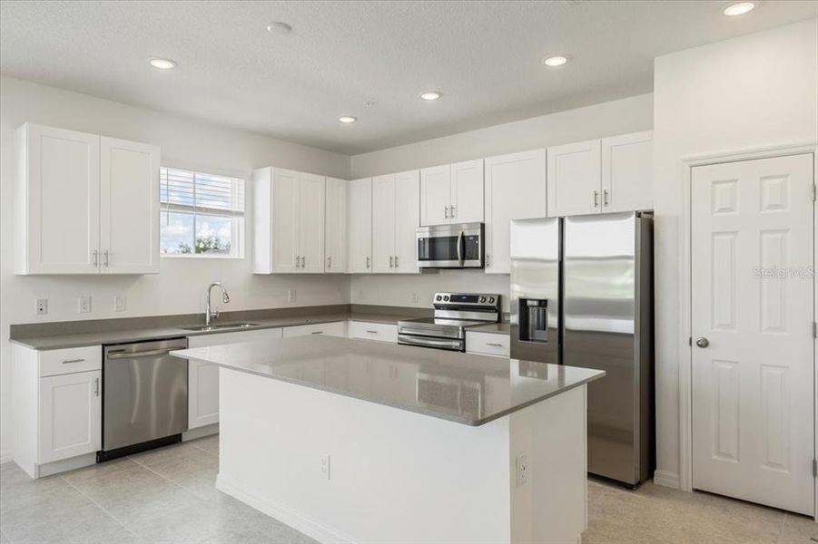 Furnished interior view inside a new home in The Residences at Emerson Park, Apopka (Image 6).