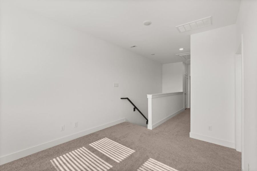 Representative unfurnished interior of a home built from the Cheverny by Chesmar Homes in Sienna Chateau, Missouri City (Image 21).