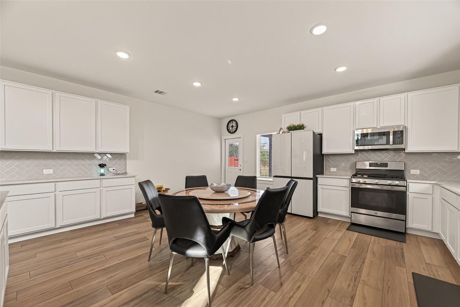 Furnished interior view inside a new home in Massey Oaks, Pearland (Image 11).