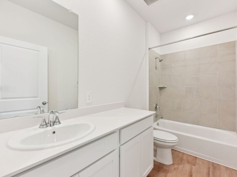 Furnished interior view inside a new home in Lexington Parke, Del Valle (Image 5).