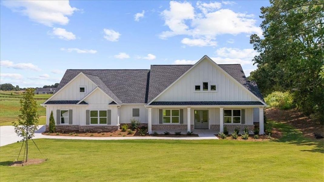 Front exterior of a new home in , Cumming, GA, highlighting curb appeal (Image 30).