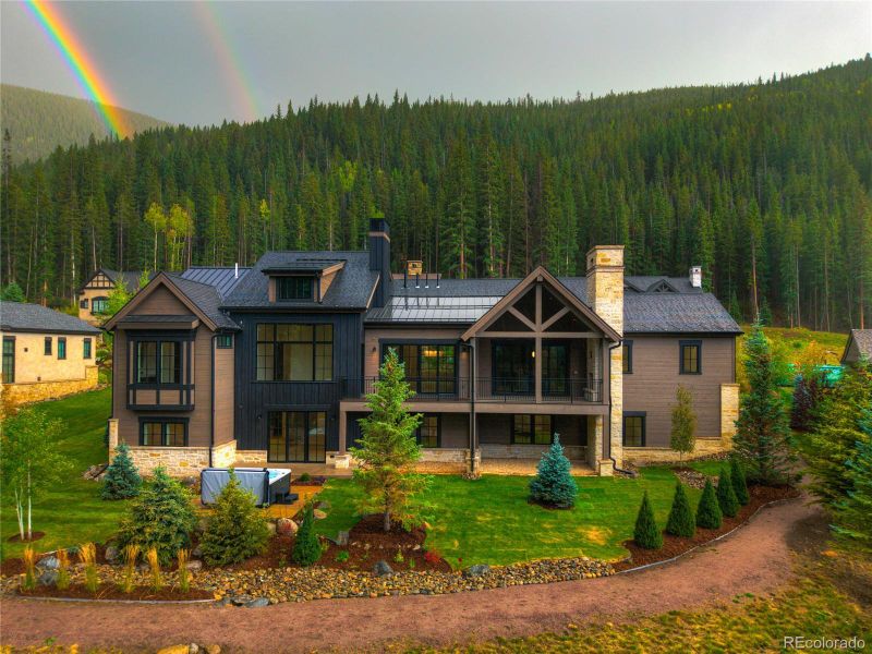 Front exterior of a new home in , Keystone, CO, highlighting curb appeal (Image 27).