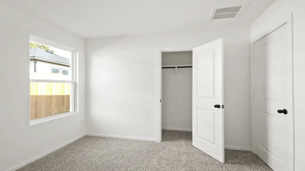 Spacious, unfurnished interior of a new home in The Canopies, Splendora (Image 16).