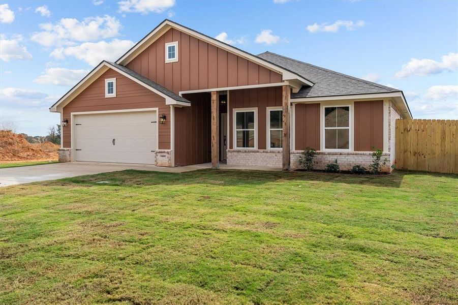Front exterior of a new home in , Lindale, TX, highlighting curb appeal (Image 16).