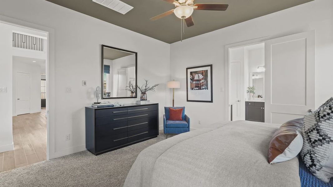Representative furnished interior of a home built from the Medina by Chesmar Homes in Elyson 50's, Katy (Image 18).