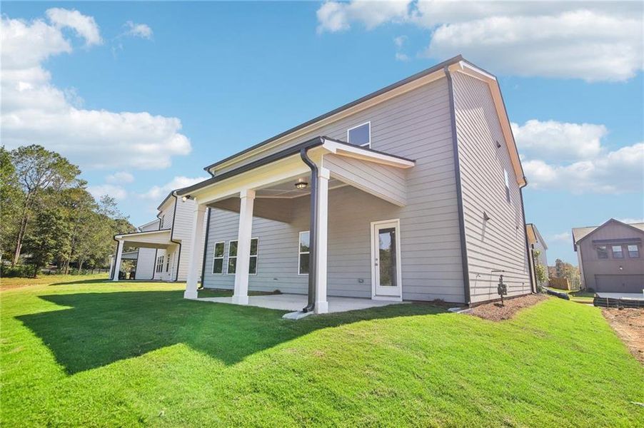 Exterior details and patio area of a home in Ponderosa Farms Estates, Gainesville (Image 21).