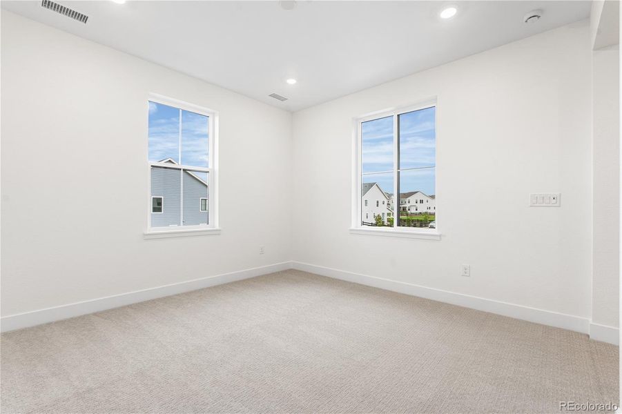 Spacious, unfurnished interior of a new home in Stargaze at Solstice, Littleton (Image 22).