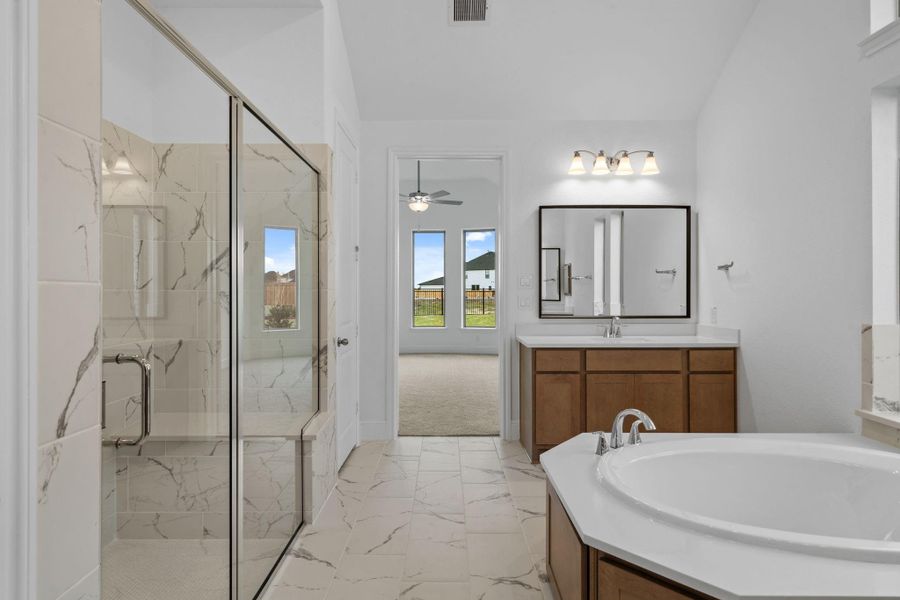 Furnished interior view inside a new home in Dunham Pointe 70', Cypress (Image 13).