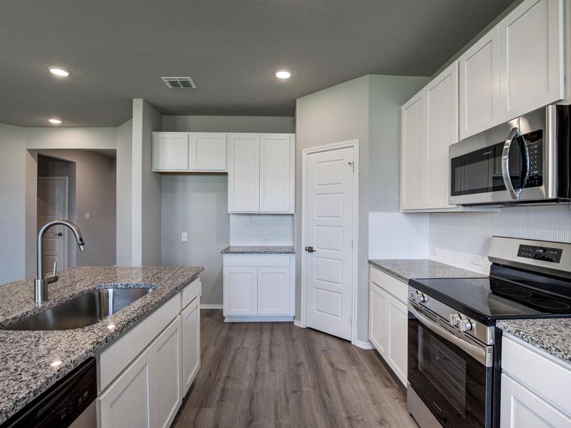 Representative furnished interior of a home built from the The Asheville E by Davidson Homes LLC in Hannah Heights, Seguin (Image 7). Representative furnished interior of a home built from the The Asheville E by Davidson Homes LLC in Hannah Heights, Seguin (Image 7).
