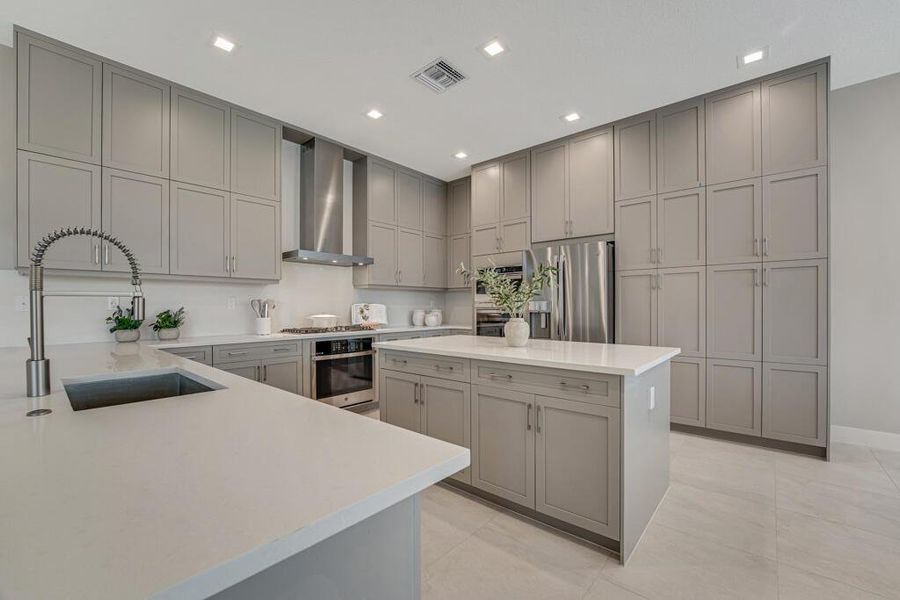 Furnished interior view inside a new home in Apex at Avenir, Palm Beach Gardens (Image 48).