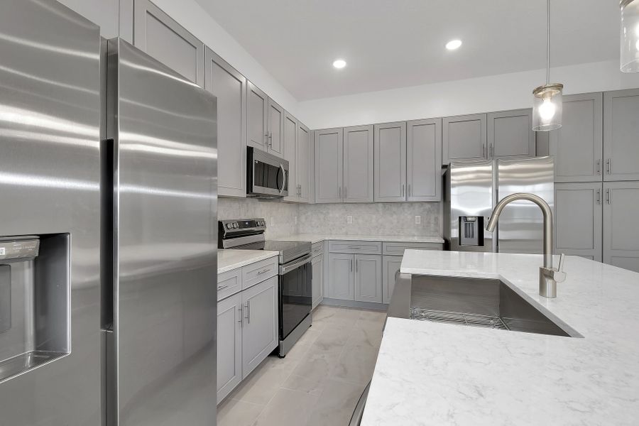 Representative furnished interior of a home built from the Sandalwood II by Park Square Residential in Paradiso Grande, Orlando (Image 6).