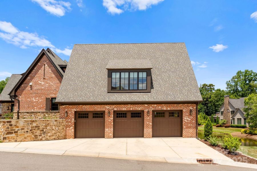 Front exterior of a new home in , Cornelius, NC, highlighting curb appeal (Image 2). Front exterior of a new home in , Cornelius, NC, highlighting curb appeal (Image 2).
