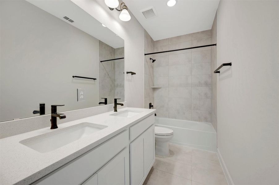 Furnished interior view inside a new home in Pomona - Grove Row Collection, Manvel (Image 4).