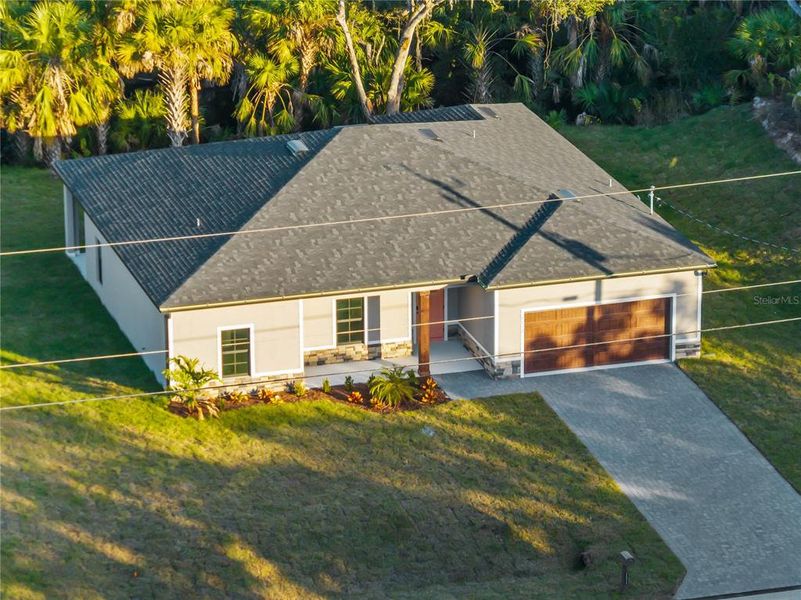 Exterior details and patio area of a home in , North Port (Image 33).