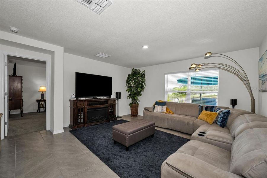 Furnished interior view inside a new home in Pine Creek, Spring Hill (Image 5). Furnished interior view inside a new home in Pine Creek, Spring Hill (Image 5).