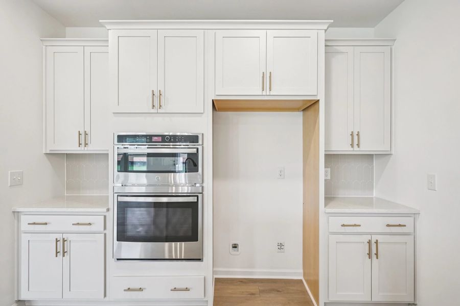 Kitchen featuring the AW Collection® Serene - Clean lines and earthy textures define the space.