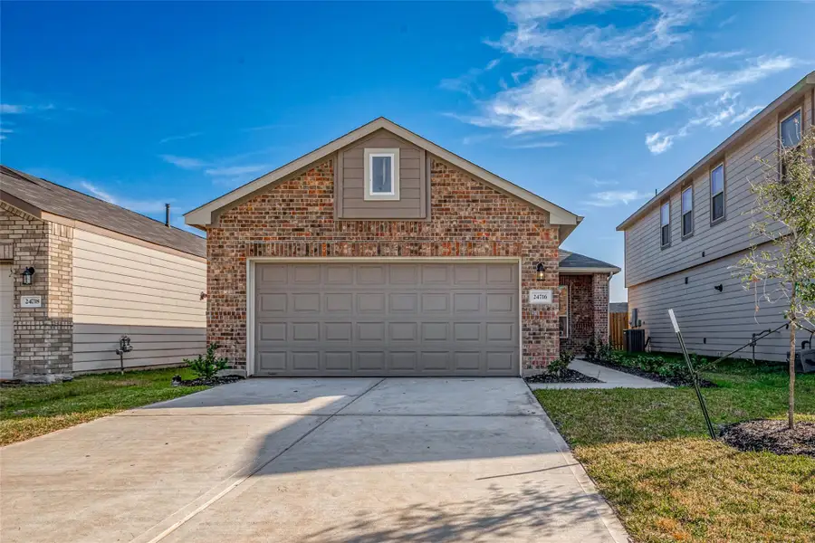 Front exterior of a new home in Crosby Terrace, Crosby, TX, highlighting curb appeal (Image 1). Front exterior of a new home in Crosby Terrace, Crosby, TX, highlighting curb appeal (Image 1).