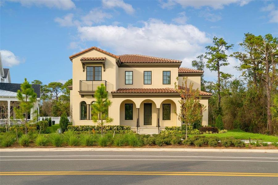 Front exterior of a new home in Celebration - Island Village, Celebration, FL, highlighting curb appeal (Image 31).