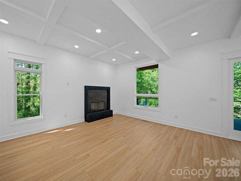 Finished basement fireplace and great room.