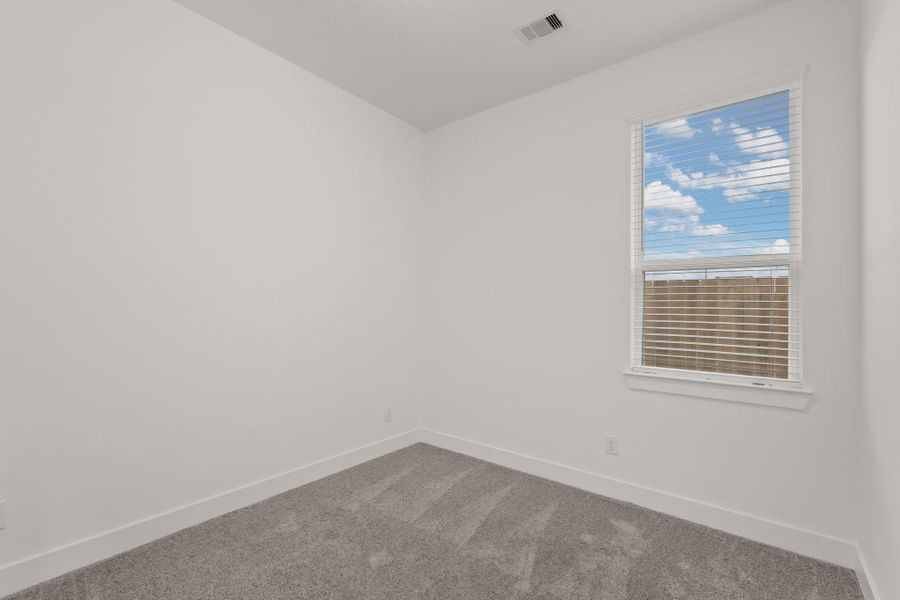 Representative unfurnished interior of a home built from the Fairway by Chesmar Homes in Riceland Alley Loads, Mont Belvieu (Image 12).