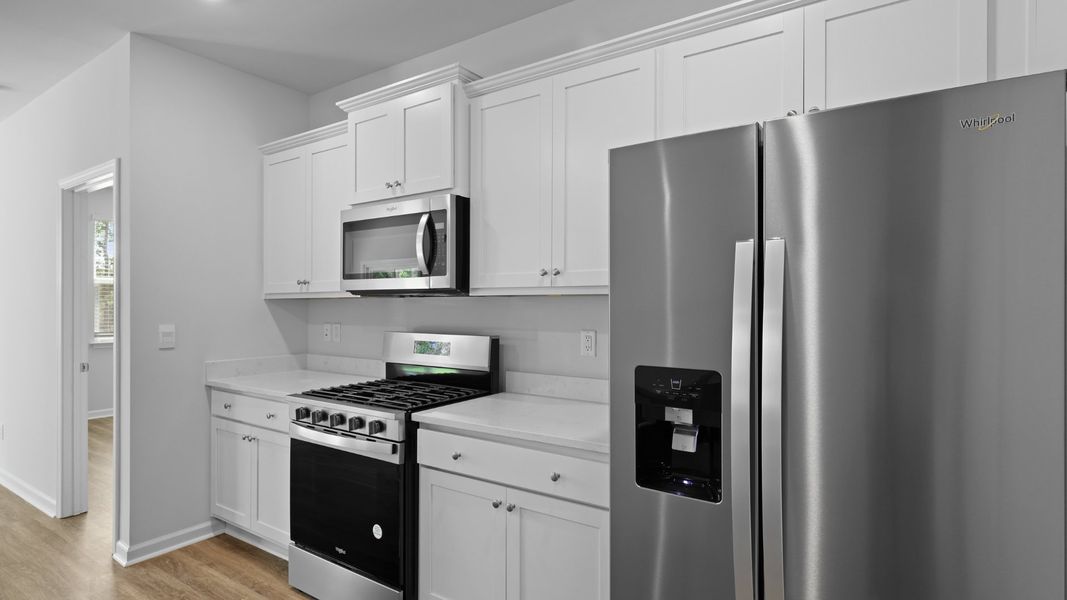 Representative furnished interior of a home built from the ARIA by D.R. Horton in Pineview North, Summerville (Image 5).