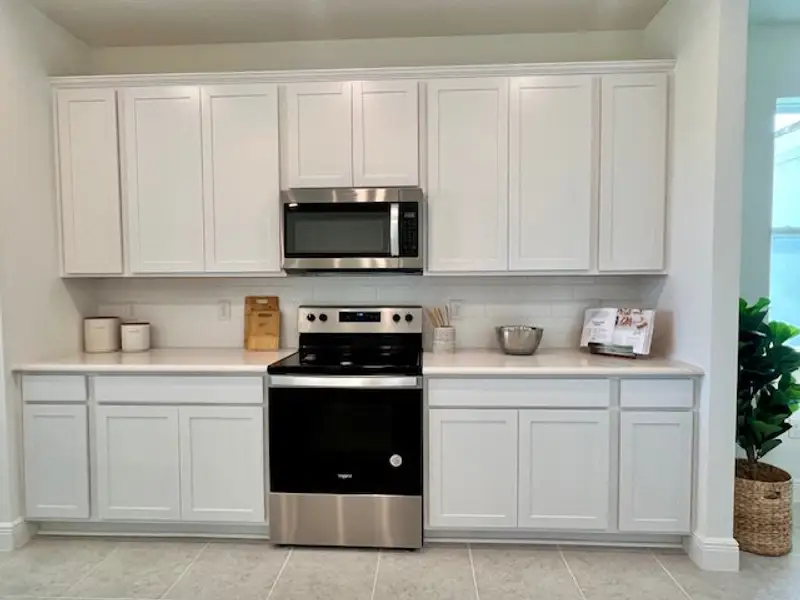 Furnished interior view inside a new home in Lakes At St Sebastian, Micco (Image 15).