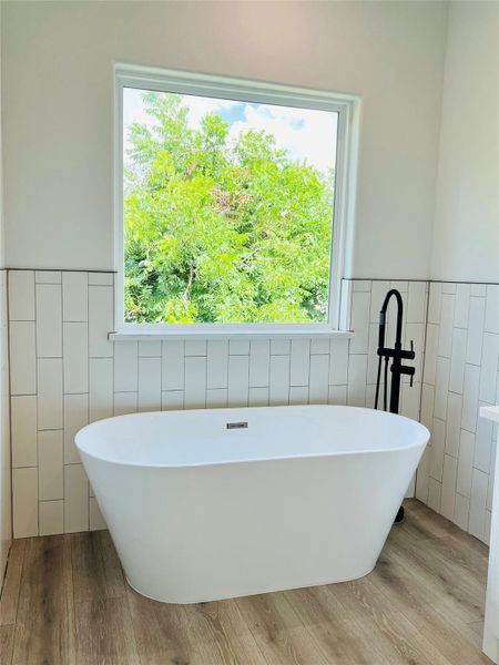 Master bath with stand alone tub