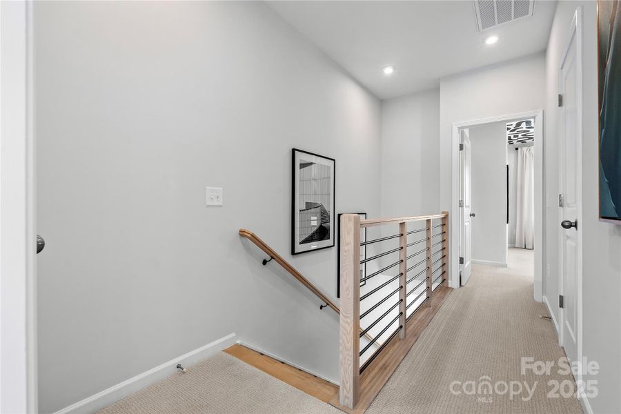 Open Rail at Third Floor Opening up the Space.