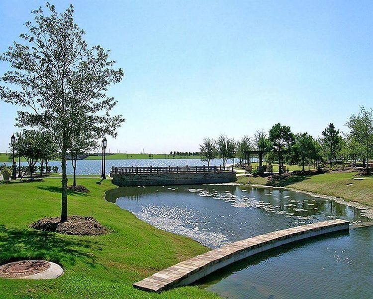 Amenities include resort-style pools/splash pads, pocket parks, dog park, heated year-round pool, disc-golf course, tennis courts, stocked lakes, complimentary use of kayaks/paddle boats, Zip-Line, birding tower, the infamous Treehouse Park, plus additional recreational facilities are being added as the community expands. A 900-acre Town Center is planned and will host upscale retail and dining venues while four smaller village centers will offer quick access to everyday conveniences. Welcome Home! Amenities include resort-style pools/splash pads, pocket parks, dog park, heated year-round pool, disc-golf course, tennis courts, stocked lakes, complimentary use of kayaks/paddle boats, Zip-Line, birding tower, the infamous Treehouse Park, plus additional recreational facilities are being added as the community expands. A 900-acre Town Center is planned and will host upscale retail and dining venues while four smaller village centers will offer quick access to everyday conveniences. Welcome Home!