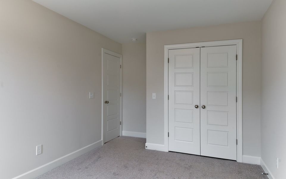 Representative unfurnished interior of a home built from the The Ivory by Cothran Homes in Holly Ridge, Greenville (Image 29).