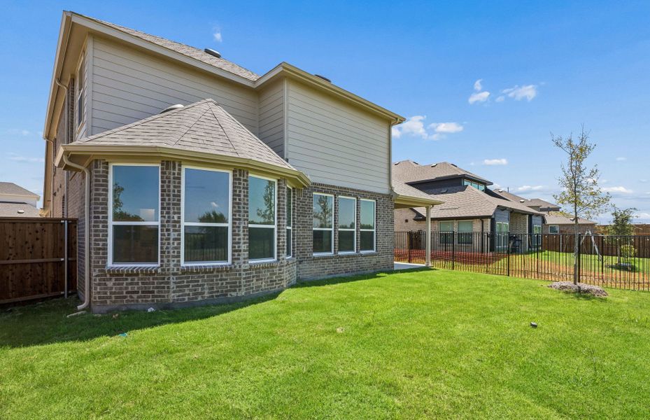 Exterior details and patio area of a home in Creekview Meadows, Pilot Point (Image 2). Exterior details and patio area of a home in Creekview Meadows, Pilot Point (Image 2).