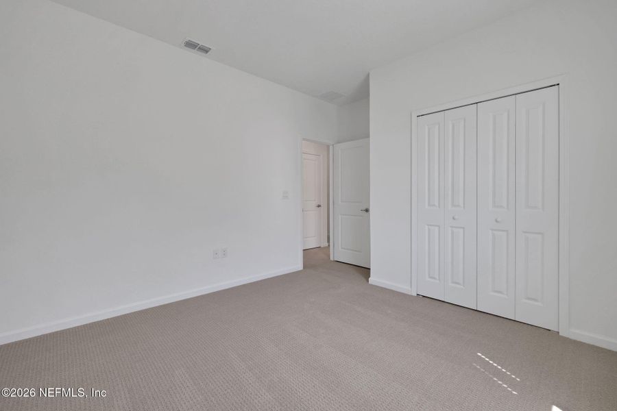 Spacious, unfurnished interior of a new home in TrailMark, St. Augustine (Image 16).