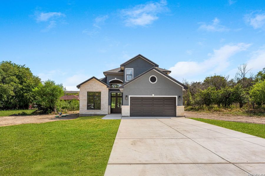 Front exterior of a new home in , Selma, TX, highlighting curb appeal (Image 30).
