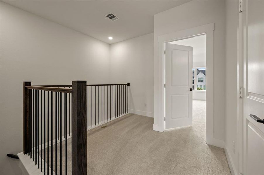The loft space located at the top of the stairs is the perfect place for a pocket office or reading nook. The loft space located at the top of the stairs is the perfect place for a pocket office or reading nook.
