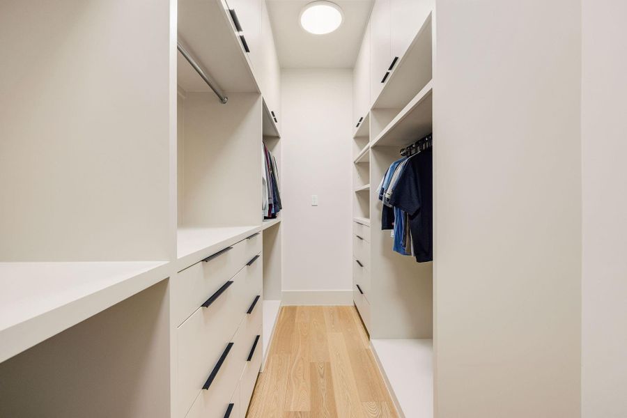 [PRIMARY CLOSET #2]  An equally impressive second walk-in closet features custom built-ins, generous storage solutions, and a boutique-inspired design that perfectly complements the luxurious primary suite.